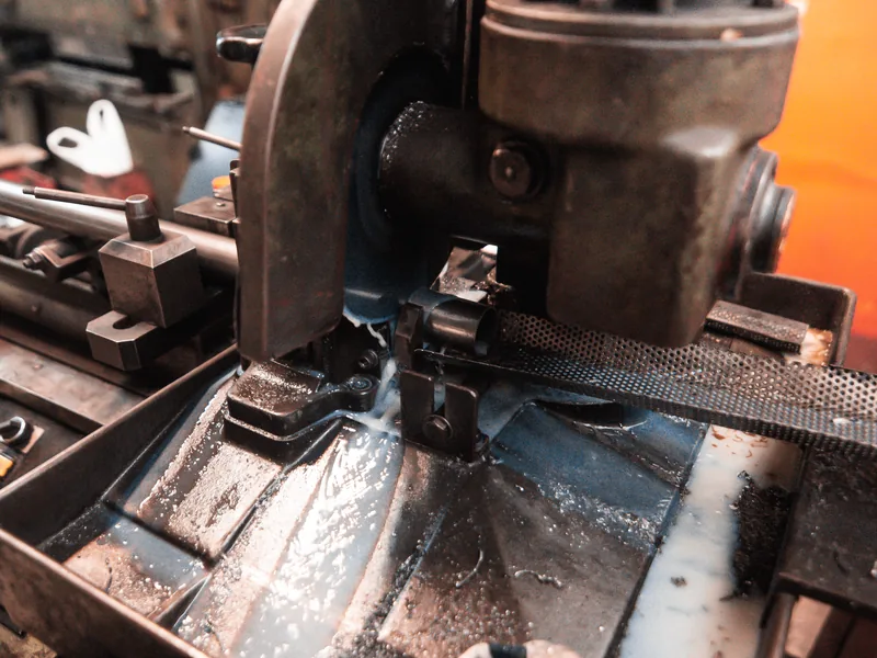 Machine and metal part detail in the Metal-M workshop